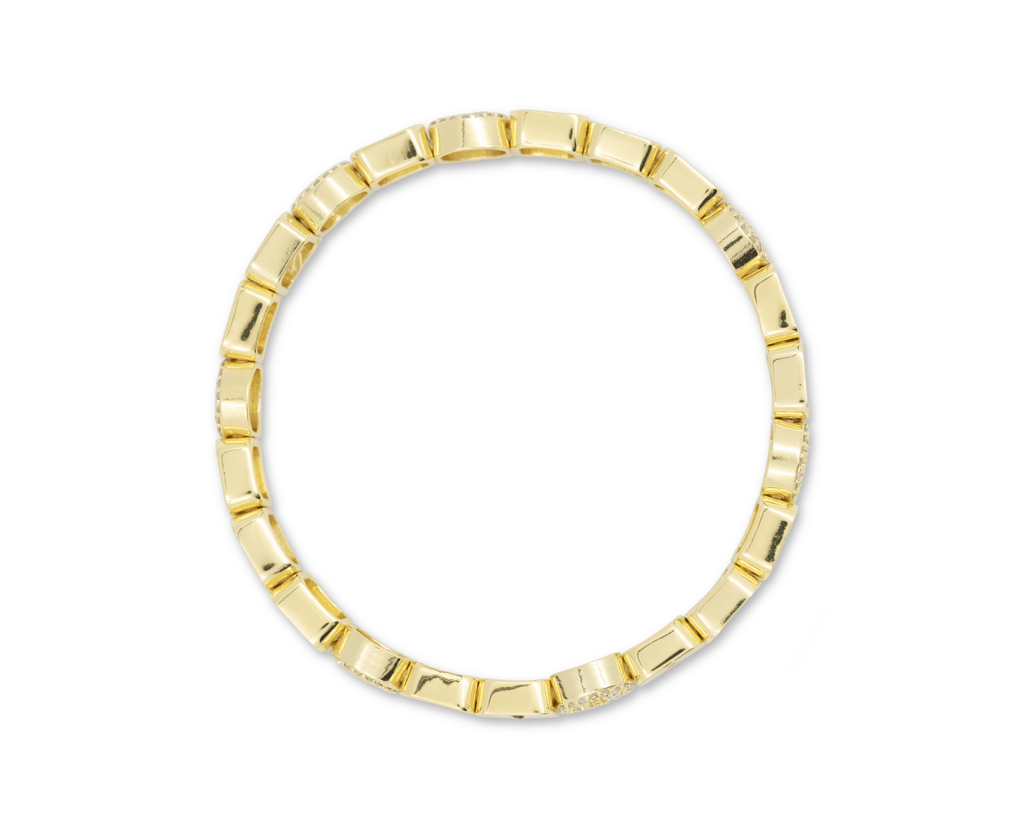 Gold ring with a geometric design on a white background