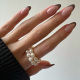 THE ROUND PEARL RING