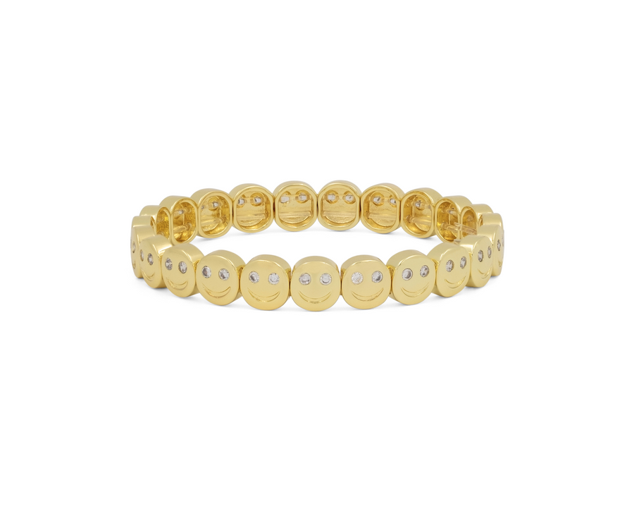 Gold-tone charm bracelet with round smiley faces and mixed blue and light-colored enamel details.