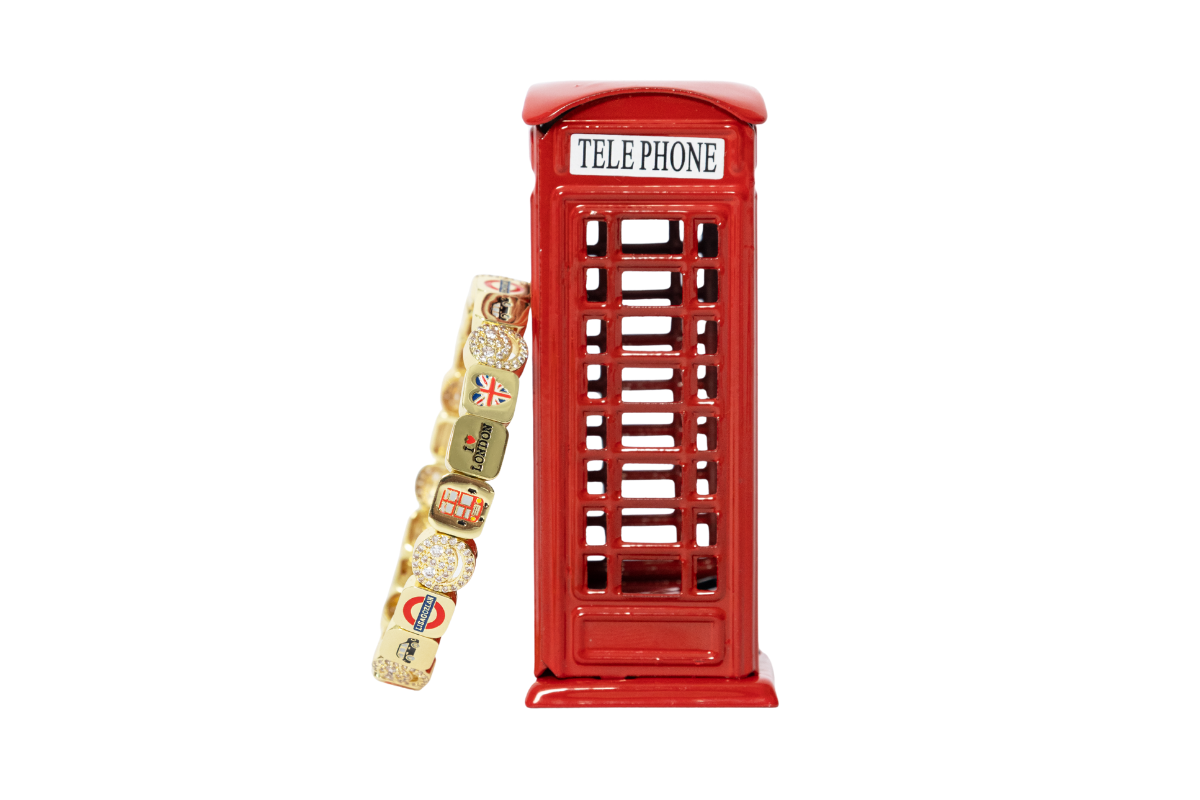 Red telephone booth with a candy bar on a white background