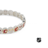 Silver NHL bracelet with red team-logo charms and rhinestone accents along band