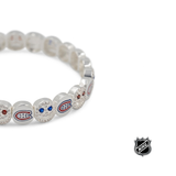 Silver-tone NHL bead bracelet close-up with blue and red logo charms