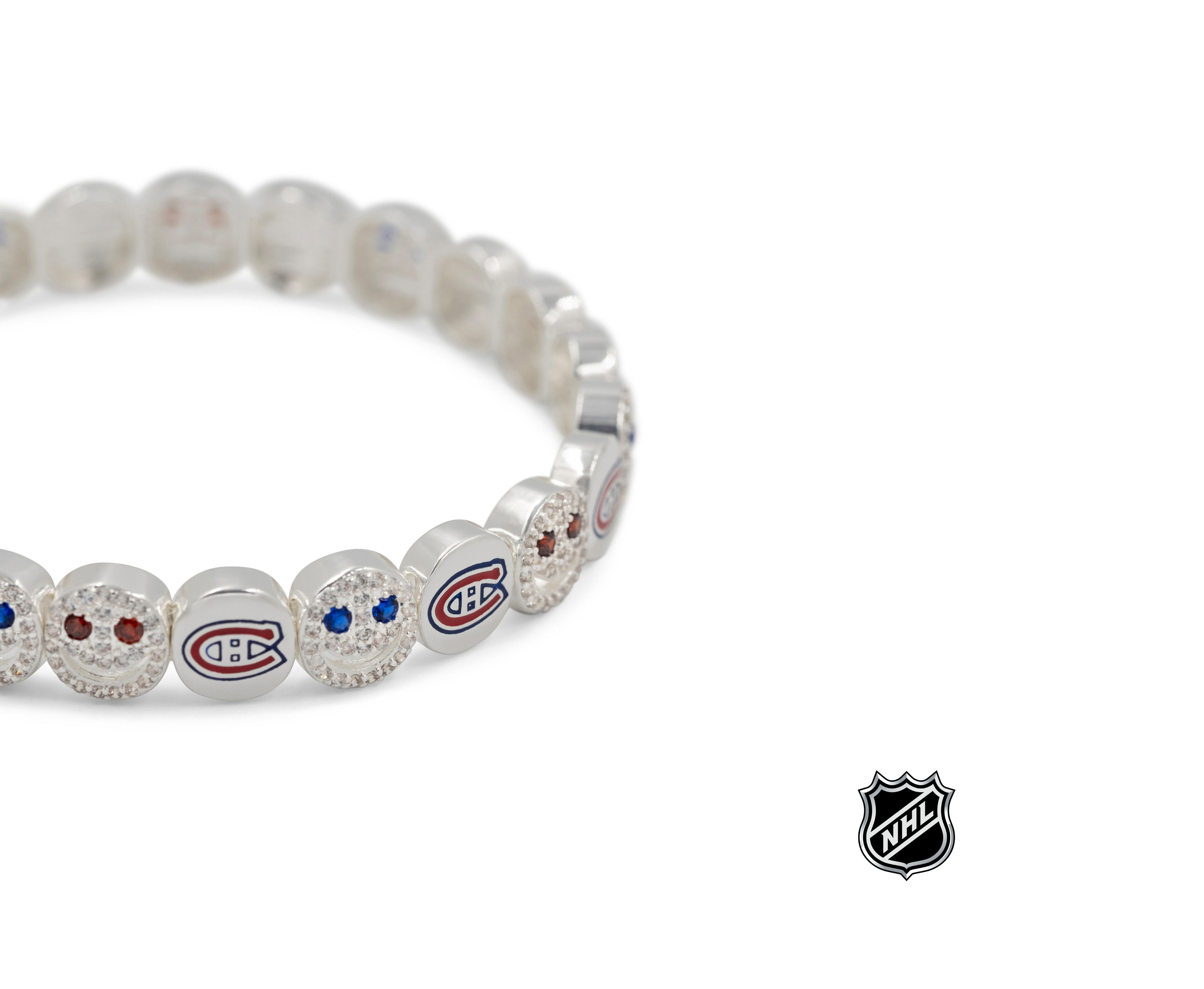 Silver-tone NHL bead bracelet close-up with blue and red logo charms