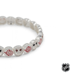 Silver-tone NHL bead bracelet close-up with red and white team logo charms