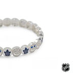 Silver-tone NHL bead bracelet close-up with blue logo charm and crystal beads