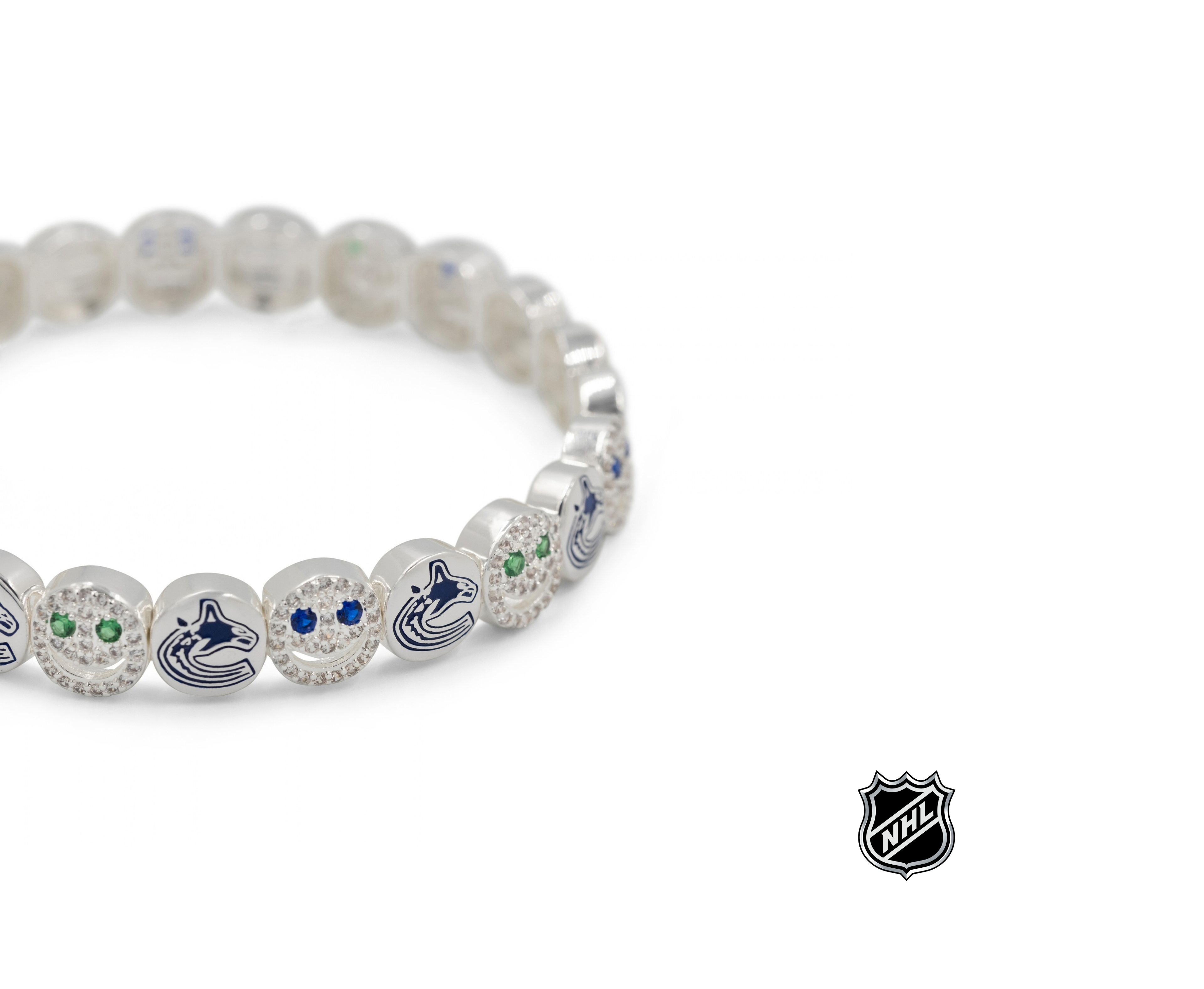 Silver NHL bracelet with team-logo charms and sparkling rhinestone details