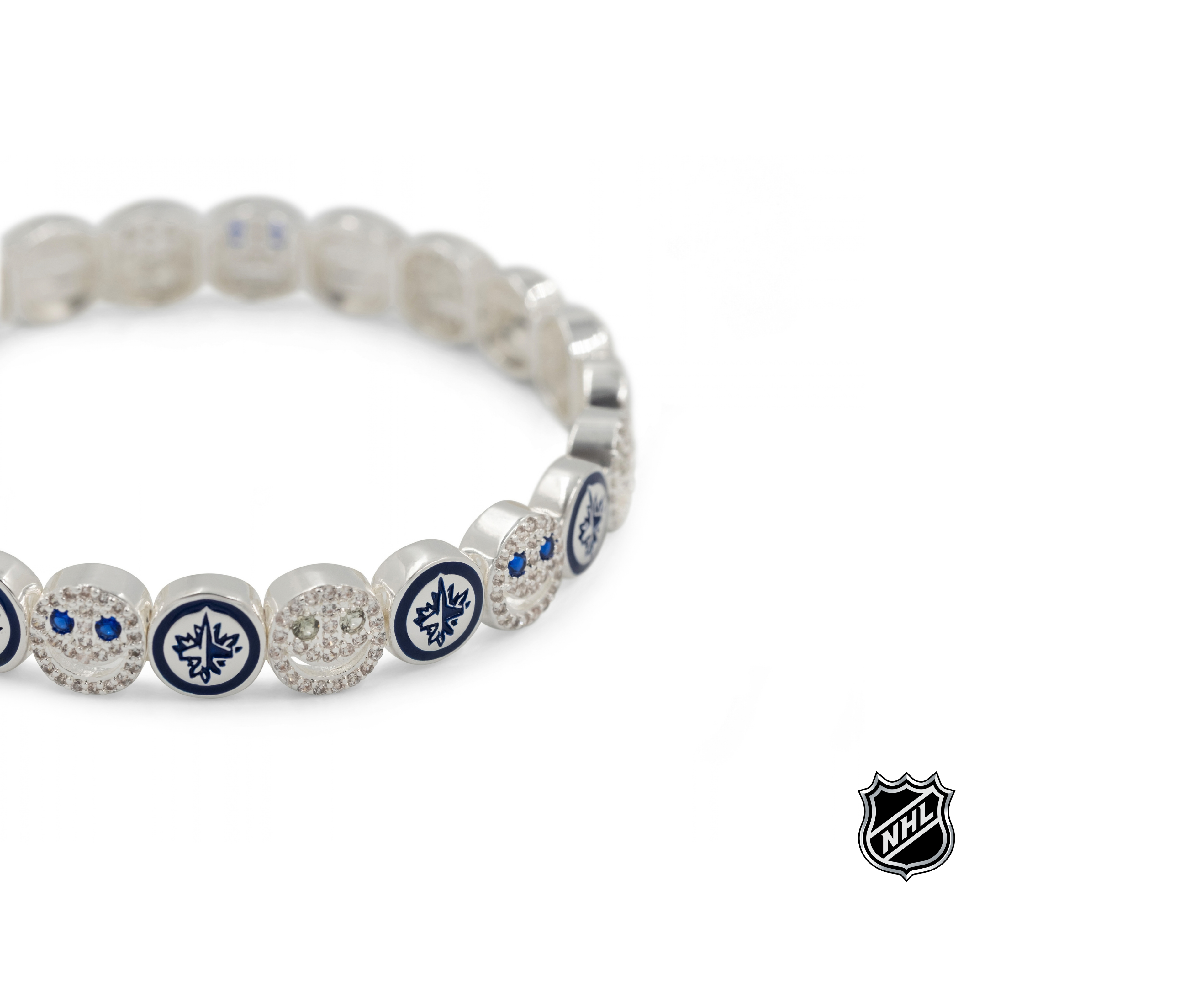 Silver NHL bracelet with blue team-logo charm and rhinestone details along band