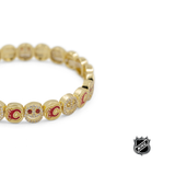 Gold-tone beaded bracelet with Calgary Flames red C charm and rhinestone center