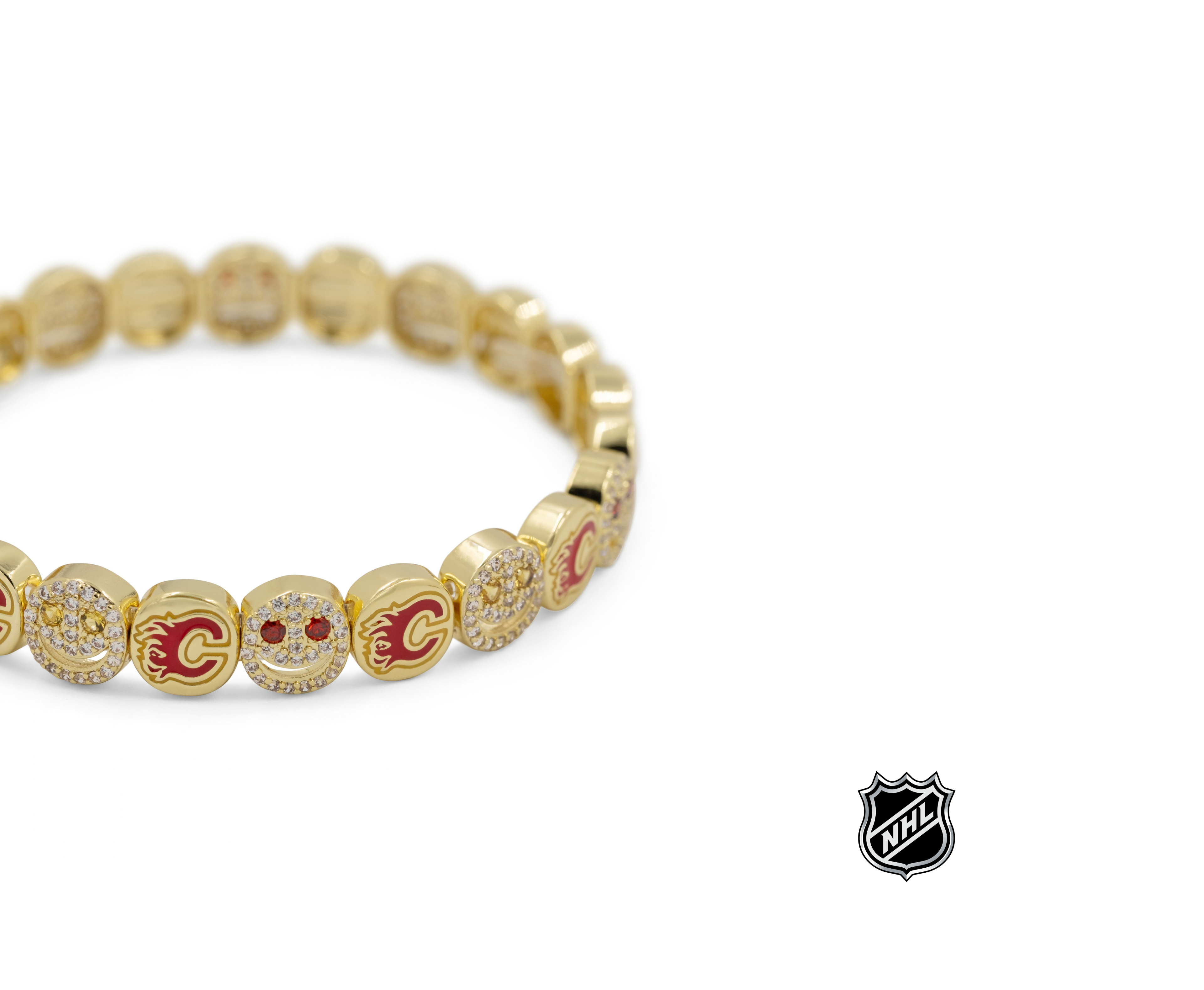 Gold-tone beaded bracelet with Calgary Flames red C charm and rhinestone center