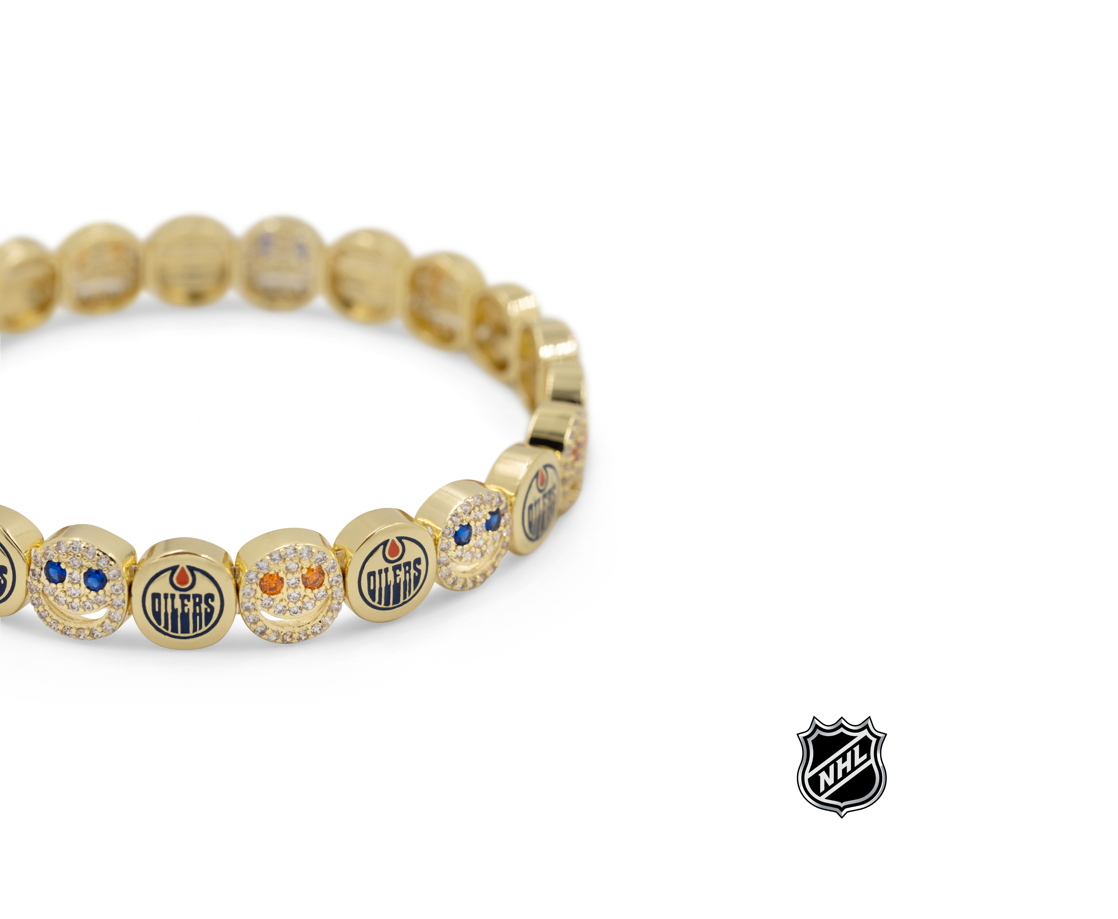 Gold-tone beaded bracelet with Edmonton Oilers medallion charms and blue accents