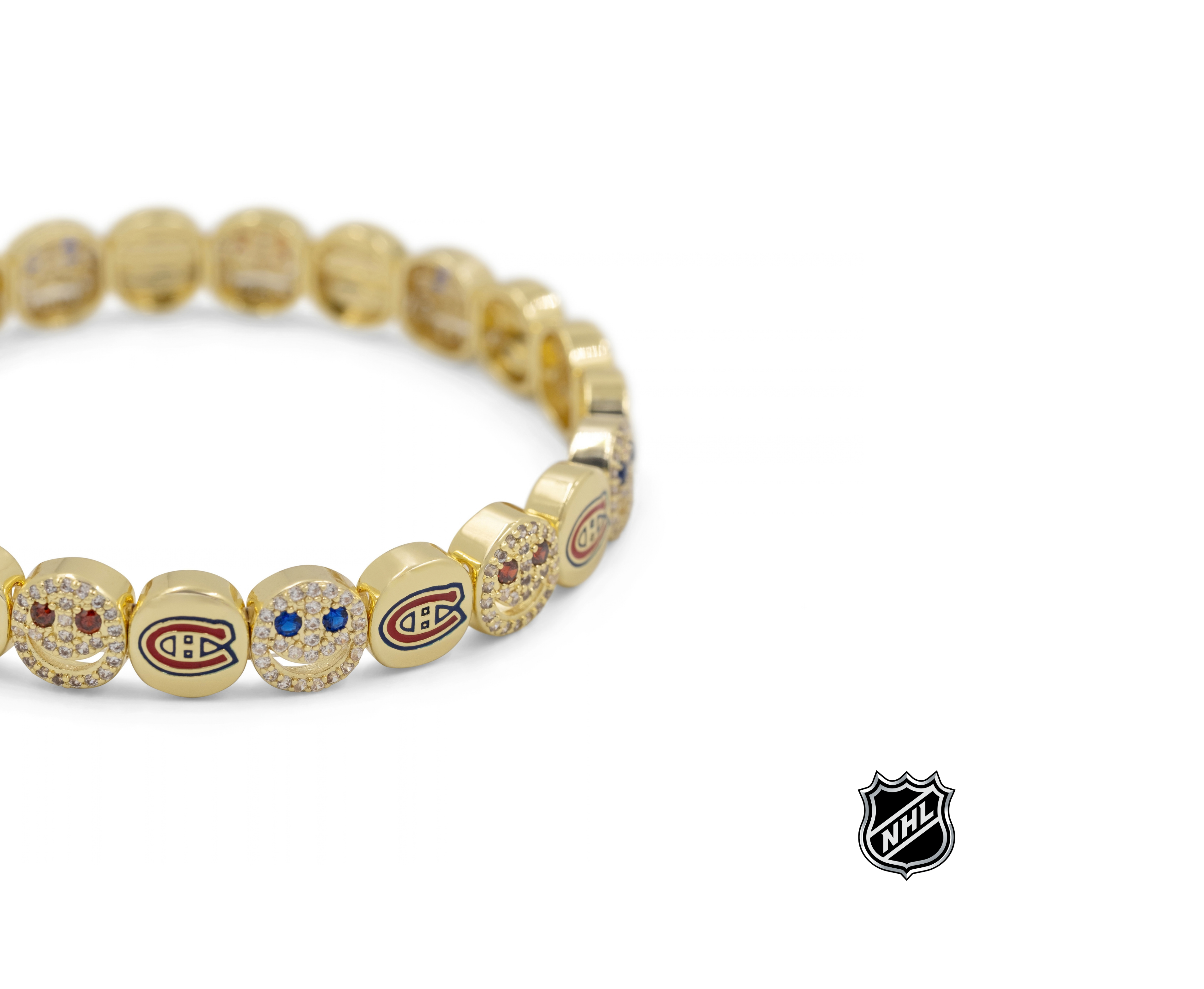 Gold NHL® bracelet with team-logo charm beads, shown from side angle