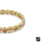 Gold NHL® bracelet side view of team-logo charm beads with colorful enamel