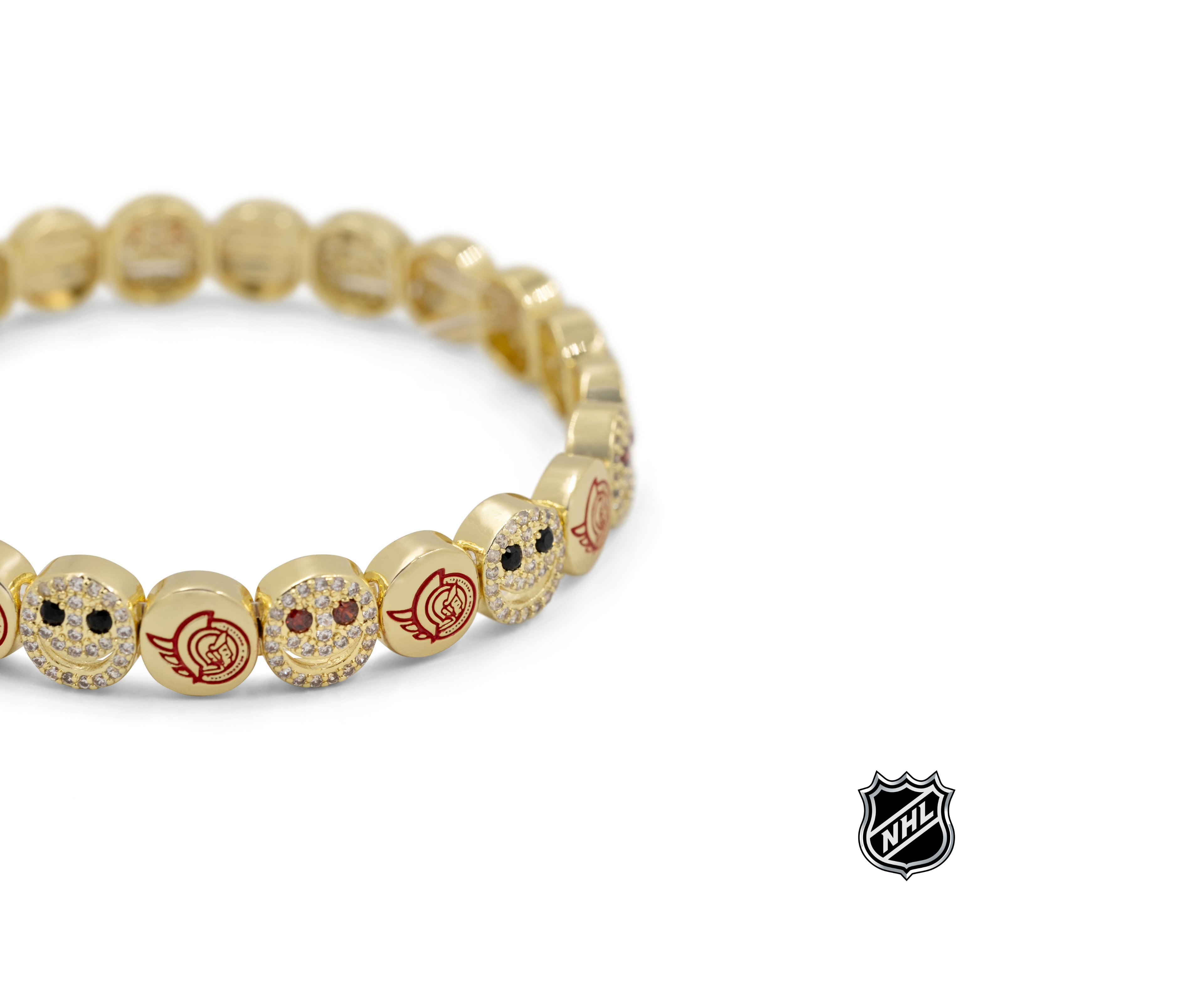 Gold NHL® bracelet side view of team-logo charm beads with colorful enamel