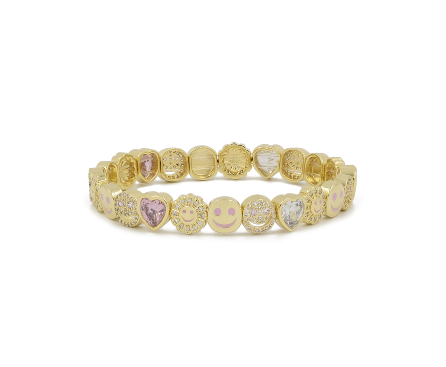 Gold-tone charm bracelet with purple hearts, face charms, and pink crystal details
