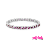 Silver heart tennis bracelet with purple heart-cut stones, flexible fit