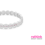 Pavé beaded bracelet with clear stones and pink accents