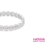Pavé beaded bracelet with clear stones and pink accents