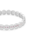 Pavé beaded bracelet with clear stones and pink accents