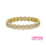 Yellow gold pavé bracelet with oval links and pink stone accents
