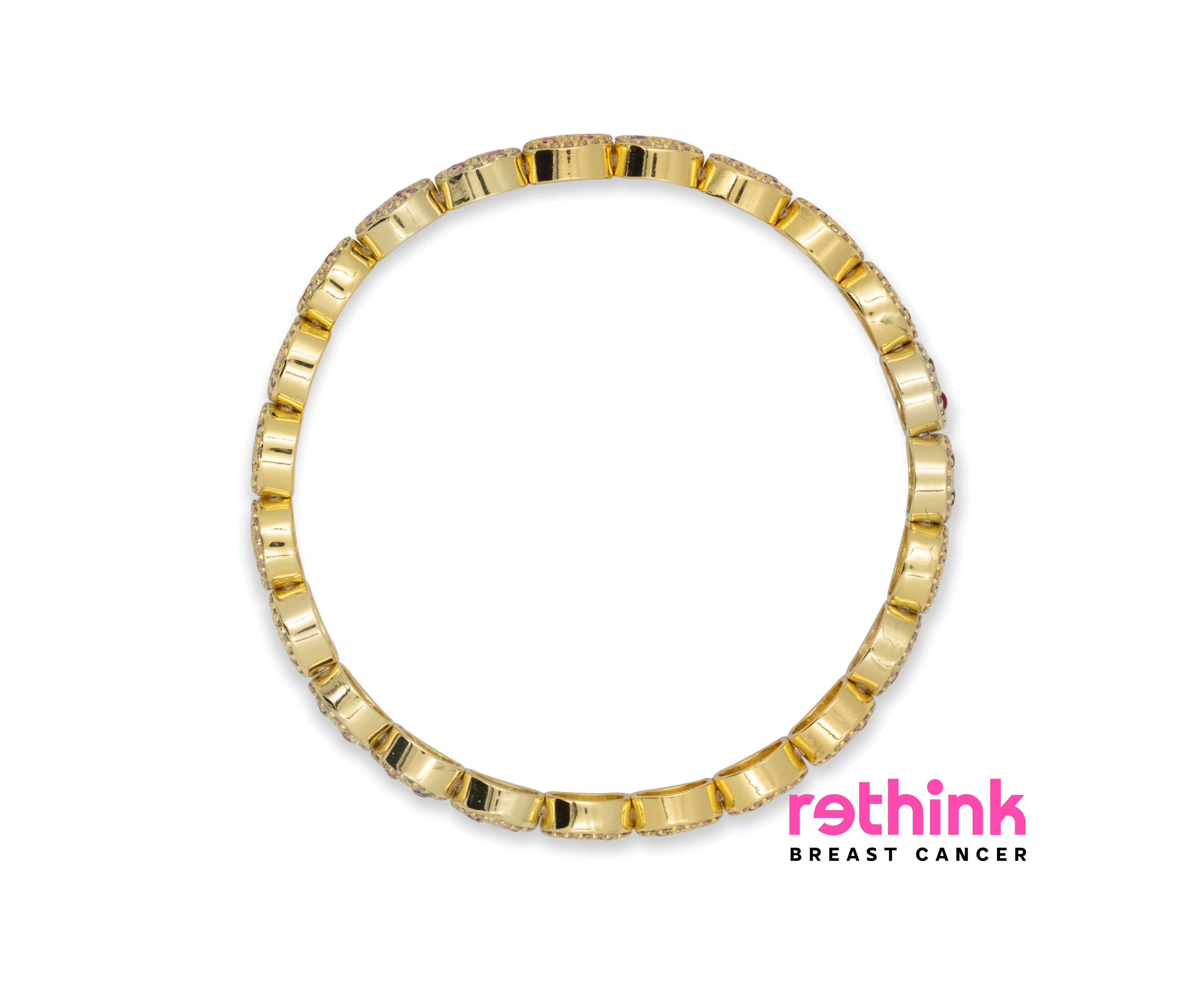 Gold cuff bracelet with ridged arc design, seamless circular band.