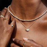 THE PAVÉ HAPPY FACE NECKLACE