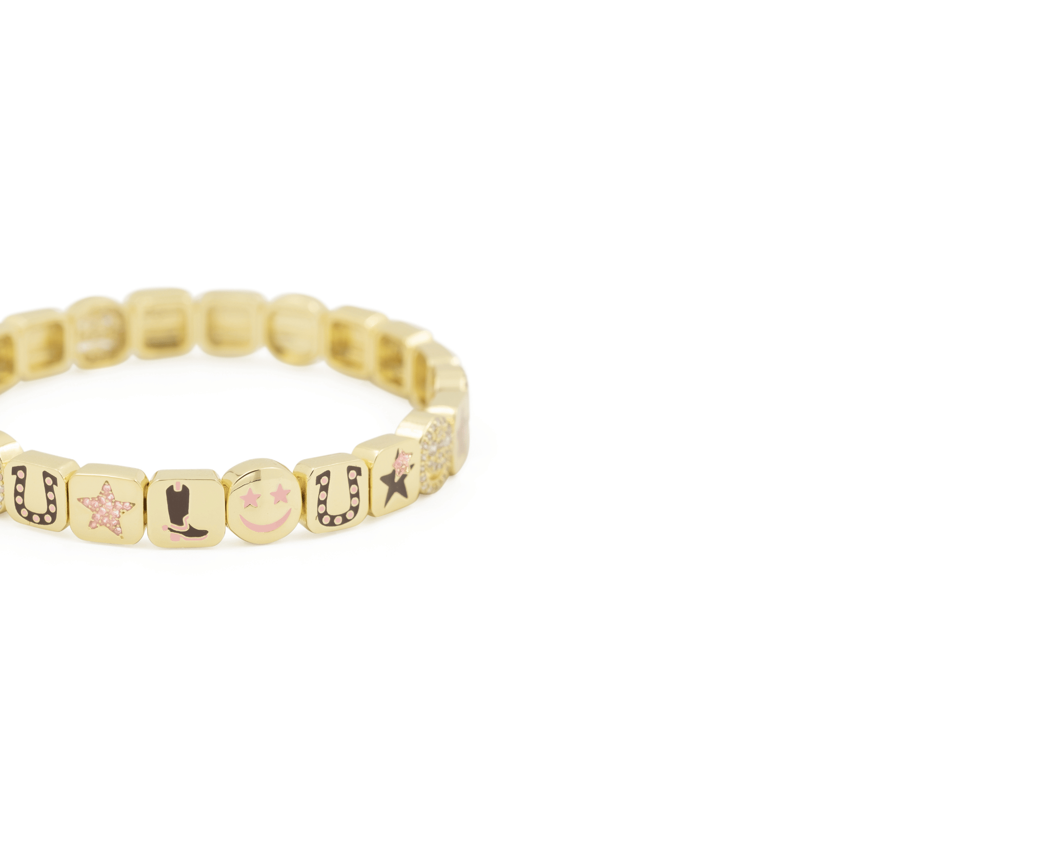 Gold beaded bracelet with engraved symbols on a white background