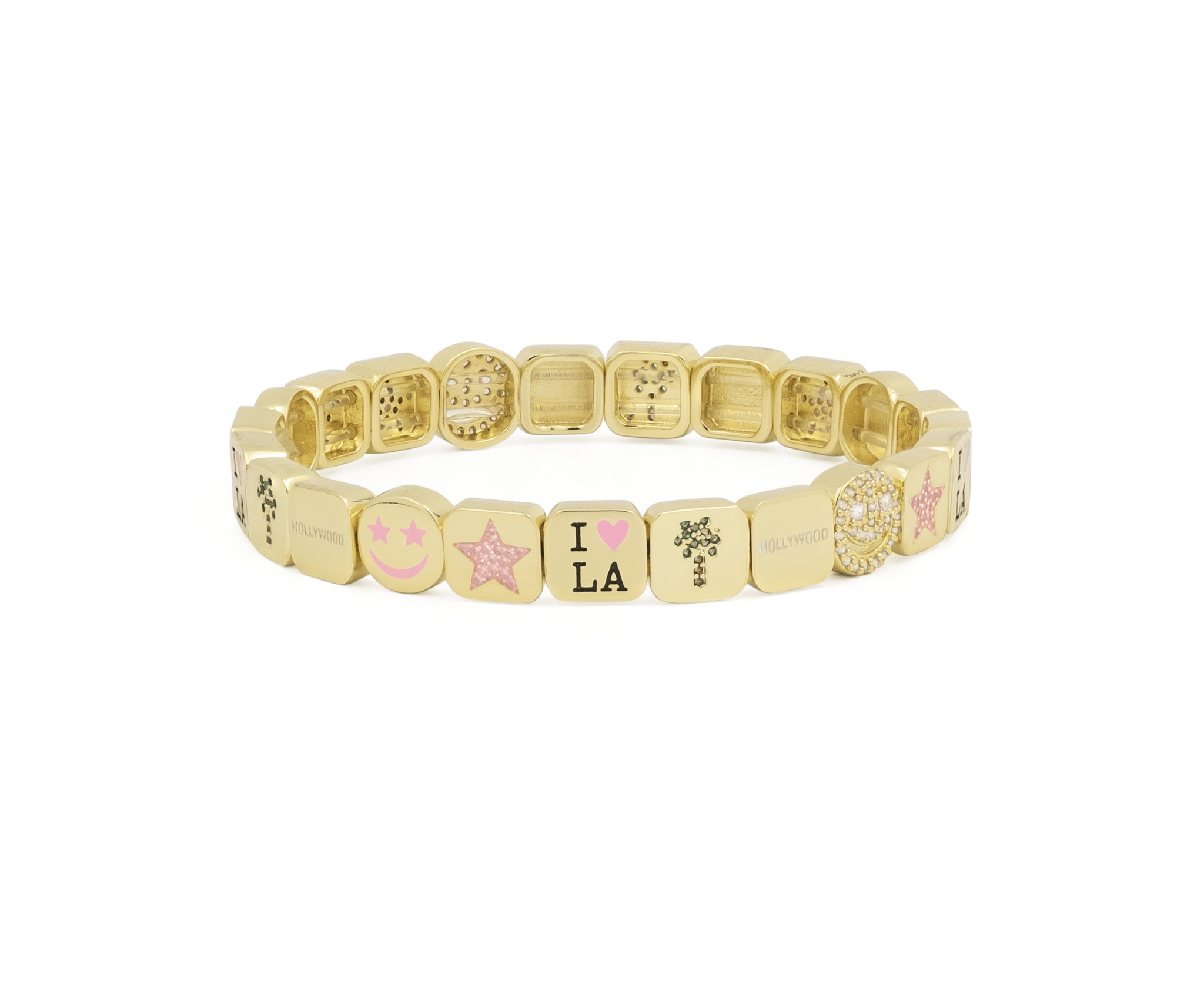 Gold bracelet with various charms on a white background
