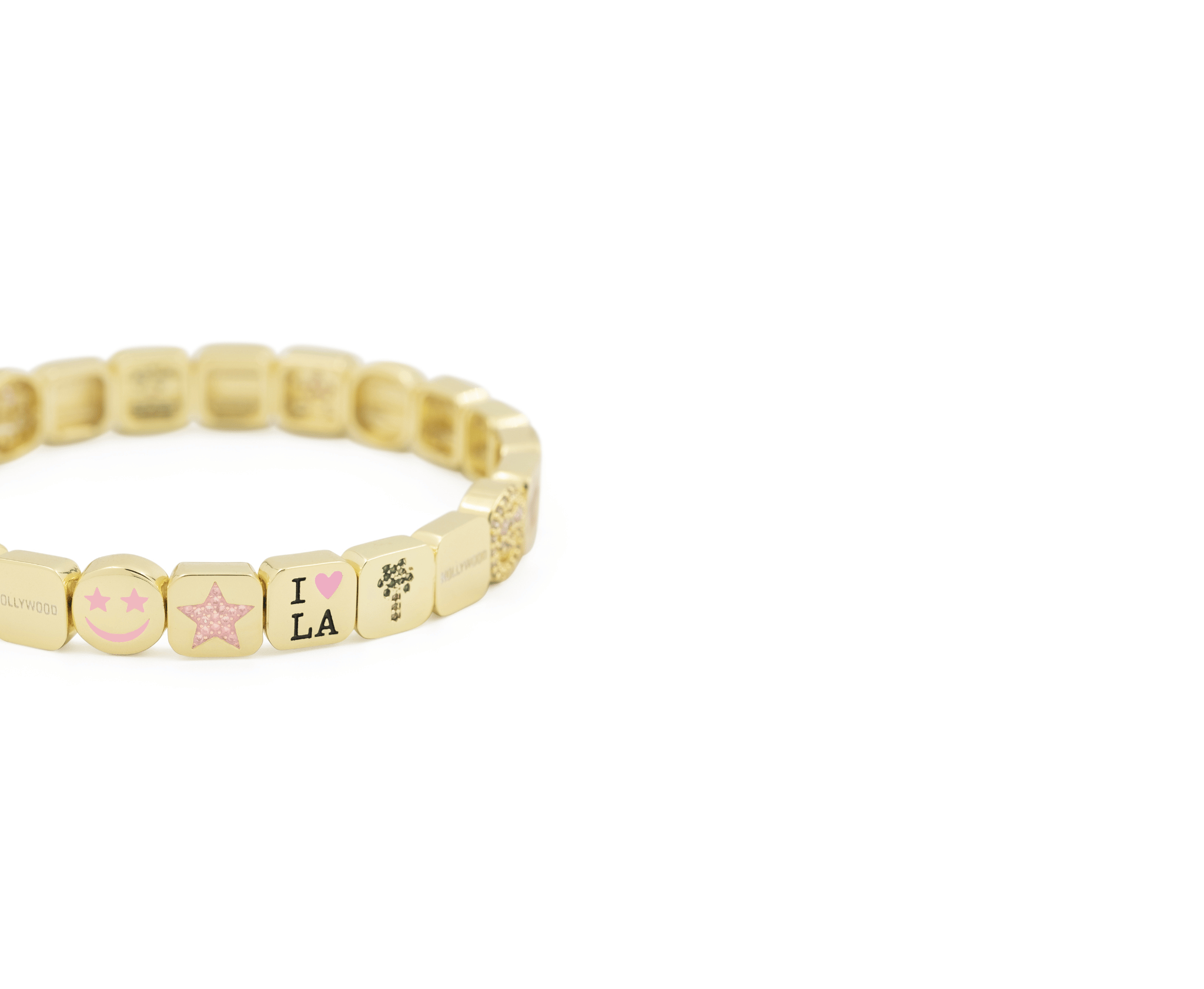 Gold bracelet with various beads on a white background